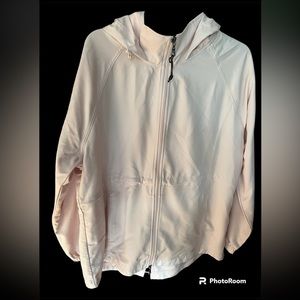 - Kirkland softshell full zipper hooded raincoat jacket.